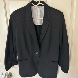 Olivia Moon soft knit short navy blazer with ruched sleeves.